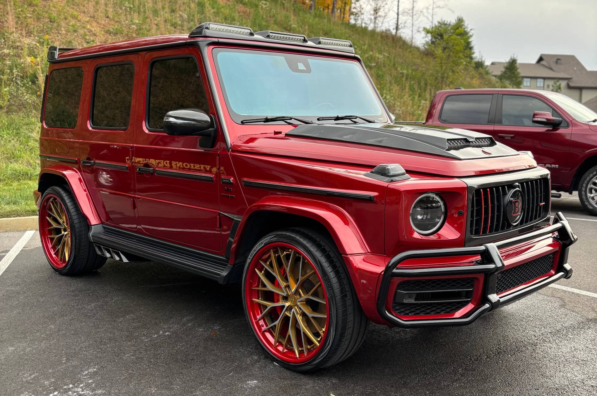 Red Brabus G-Wagon with gold wheels, freshly detailed by Visions Detailing